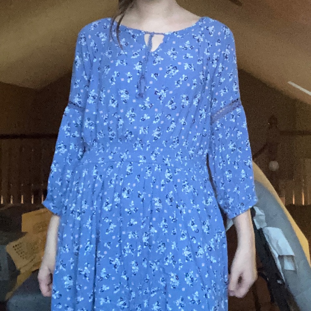 I’m selling a pretty blue dress with flowers!